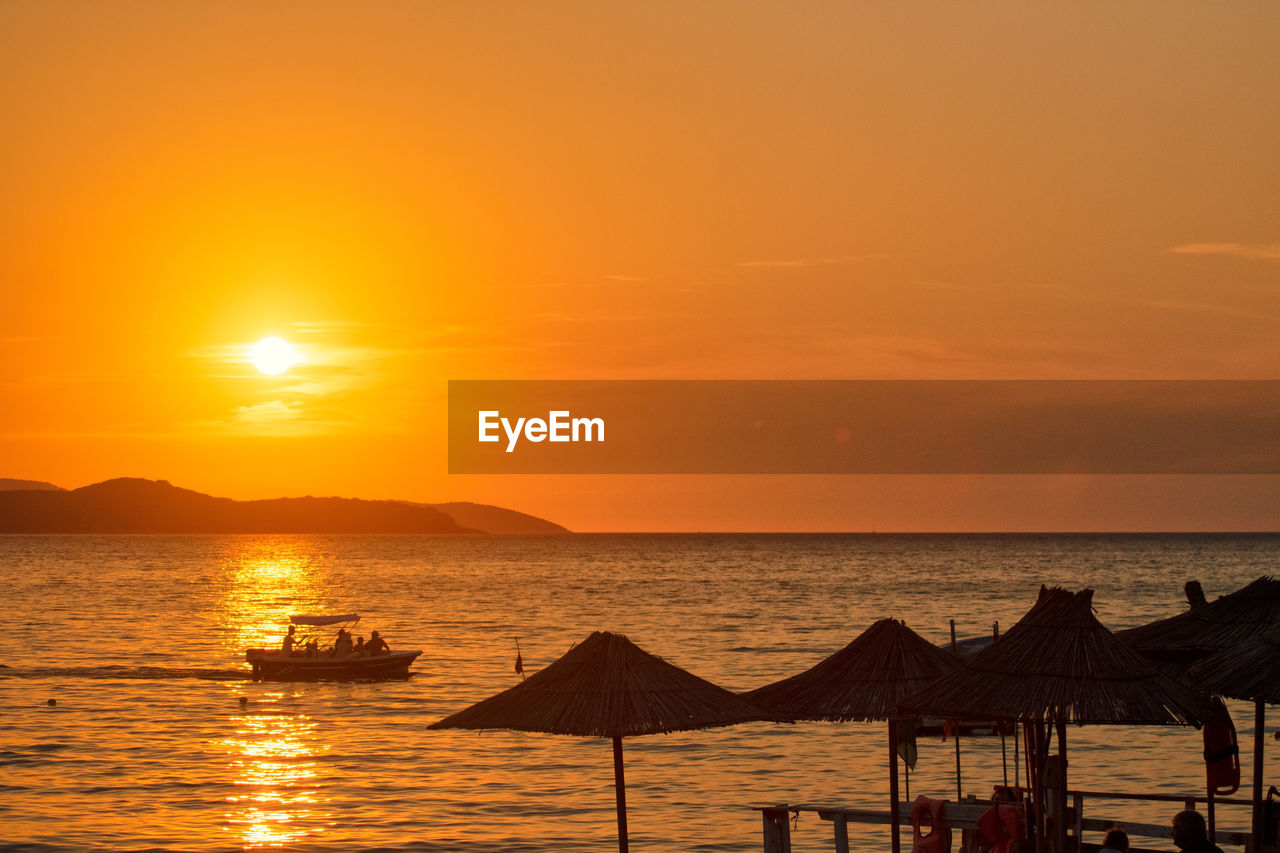 SCENIC VIEW OF SEA DURING SUNSET