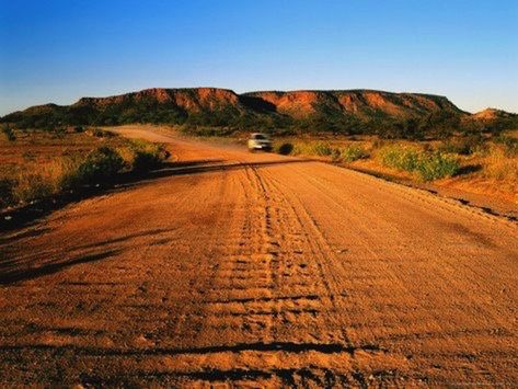 ROAD PASSING THROUGH LANDSCAPE