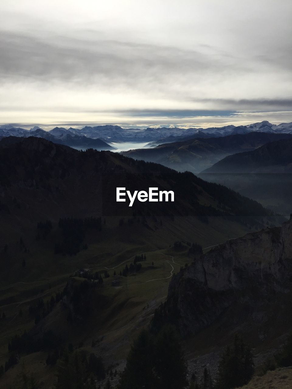 High angle view of landscape and mountains against sky