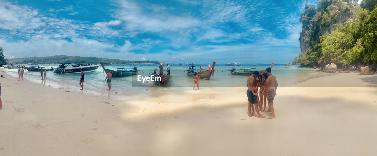 GROUP OF PEOPLE ON BEACH