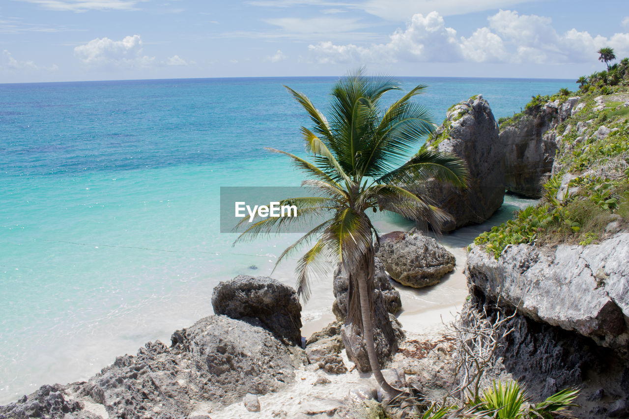 Scenic view of sea against cloudy sky