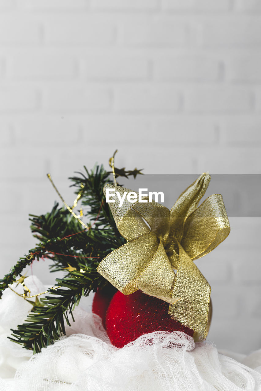 CLOSE-UP OF CHRISTMAS TREE ON TABLE