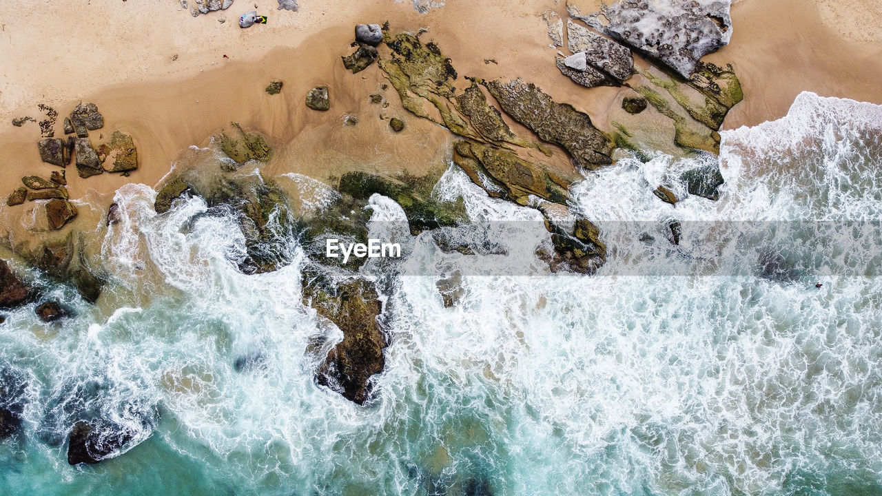 High angle view of rocks on beach