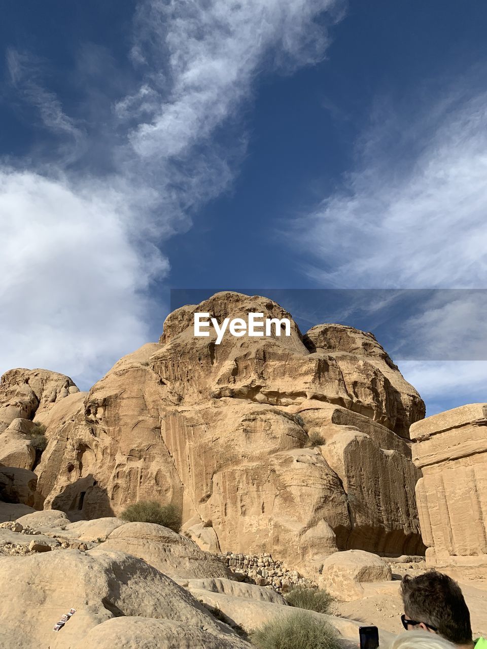 Low angle view of rock formations against sky