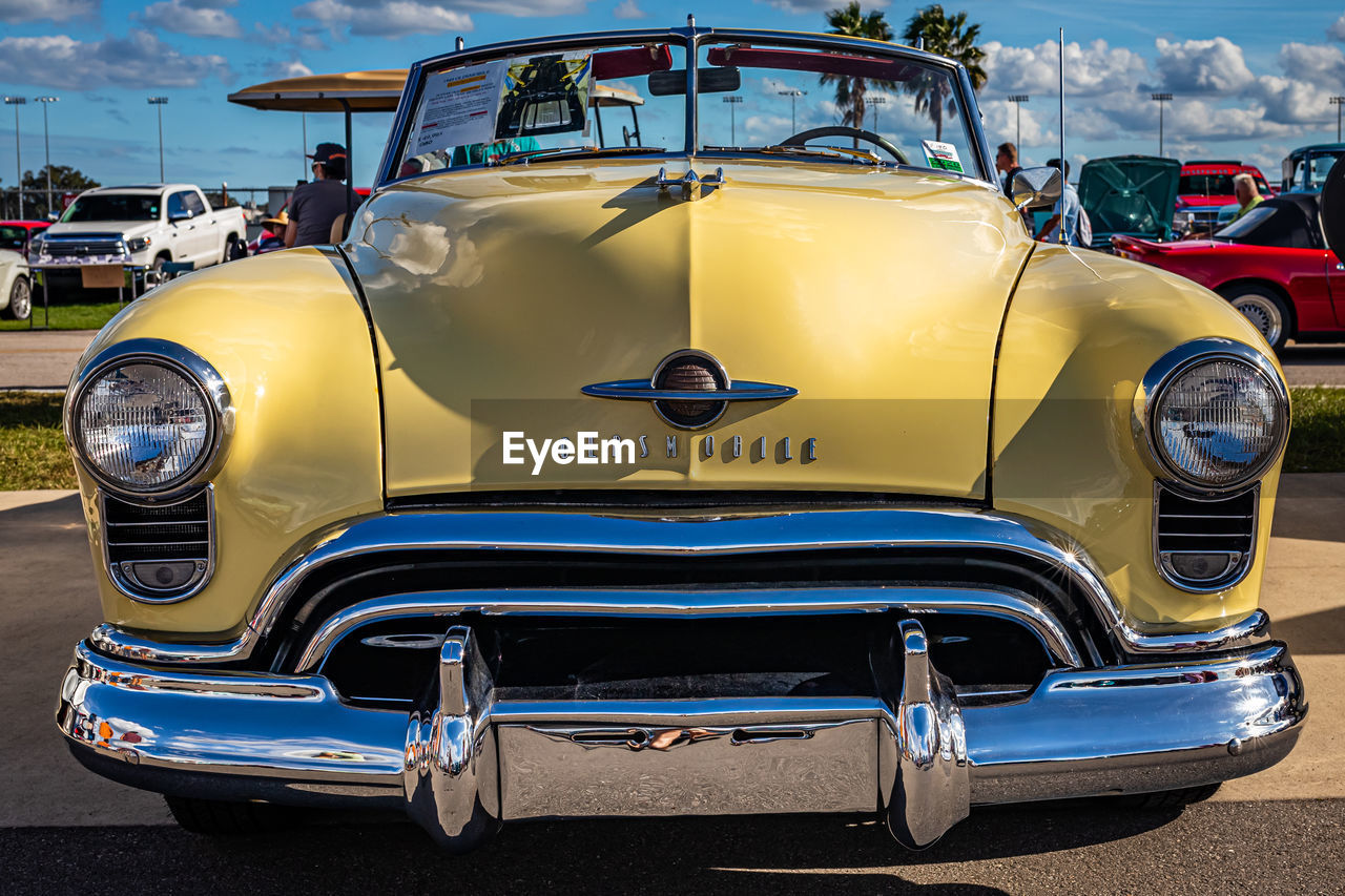 VINTAGE CAR ON ROAD