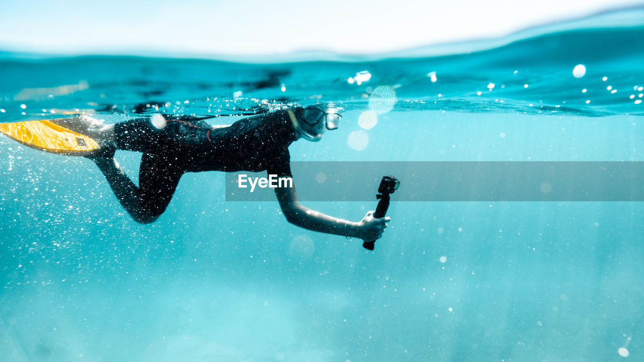 Man swimming in sea