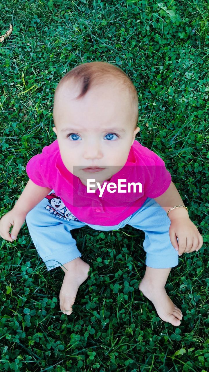HIGH ANGLE PORTRAIT OF CUTE BABY GIRL