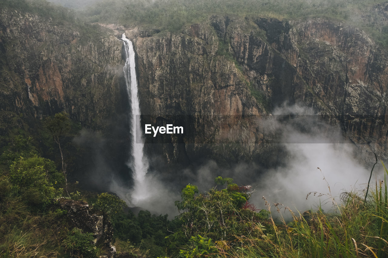 Wallaman falls 268 meter drop on a foggy day, queensland, australia.