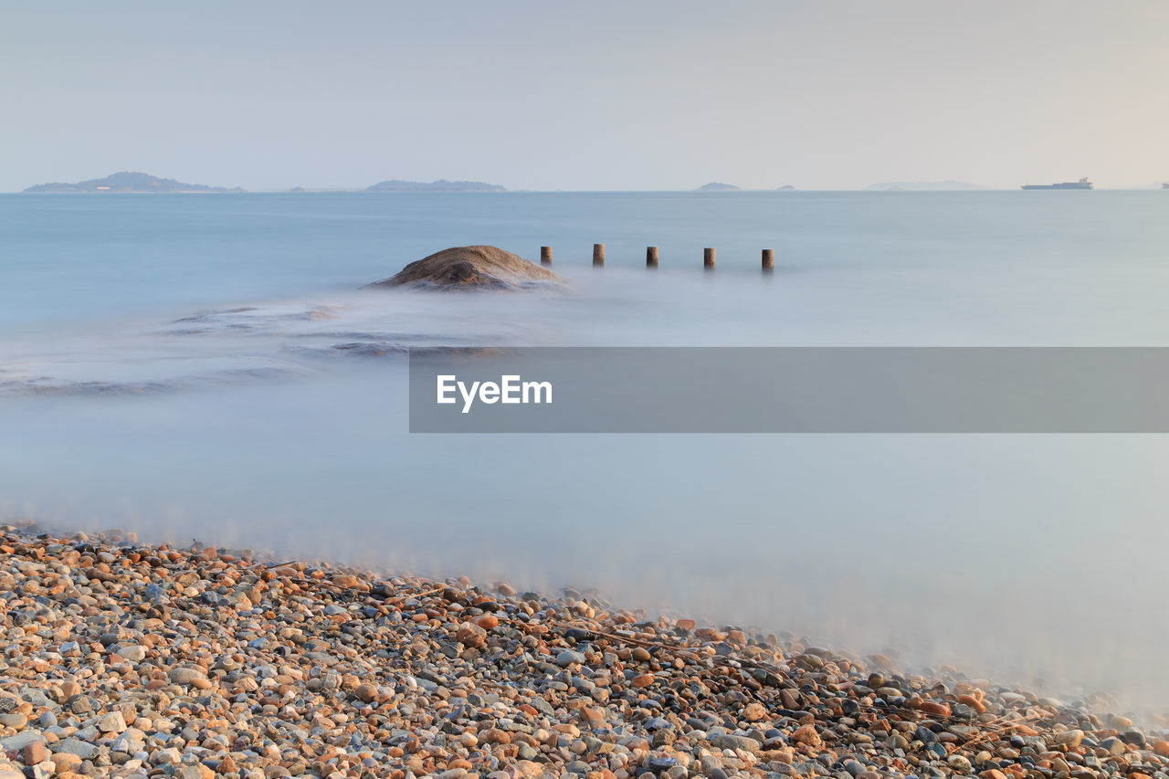 Scenic view of sea against clear sky