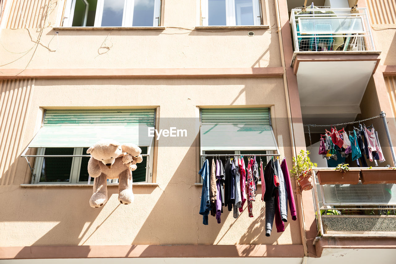 CLOTHES DRYING ON BUILDING