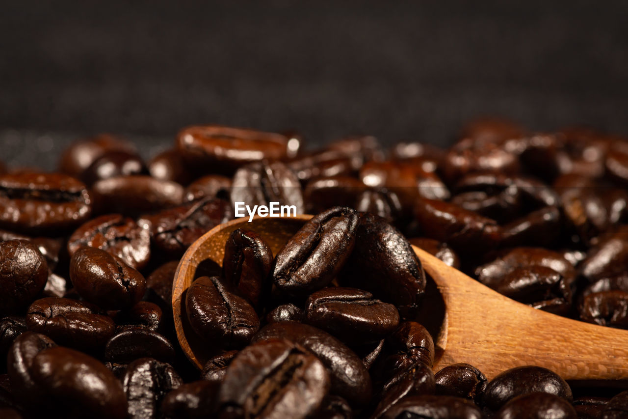 Close-up of coffee beans on table