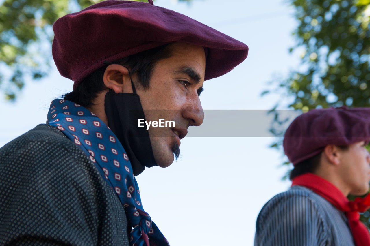 Argentinian traditional people wearing face mask