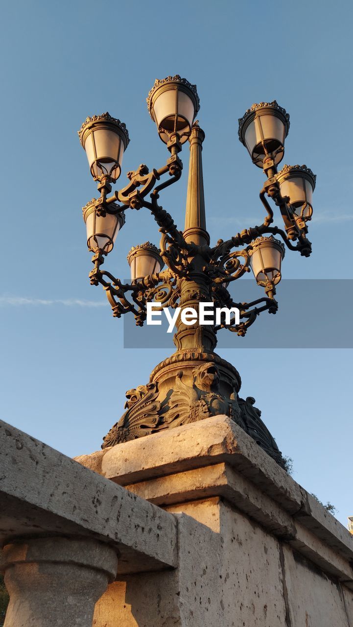 Low angle view of street light against clear sky. valnecia, spain. classical style