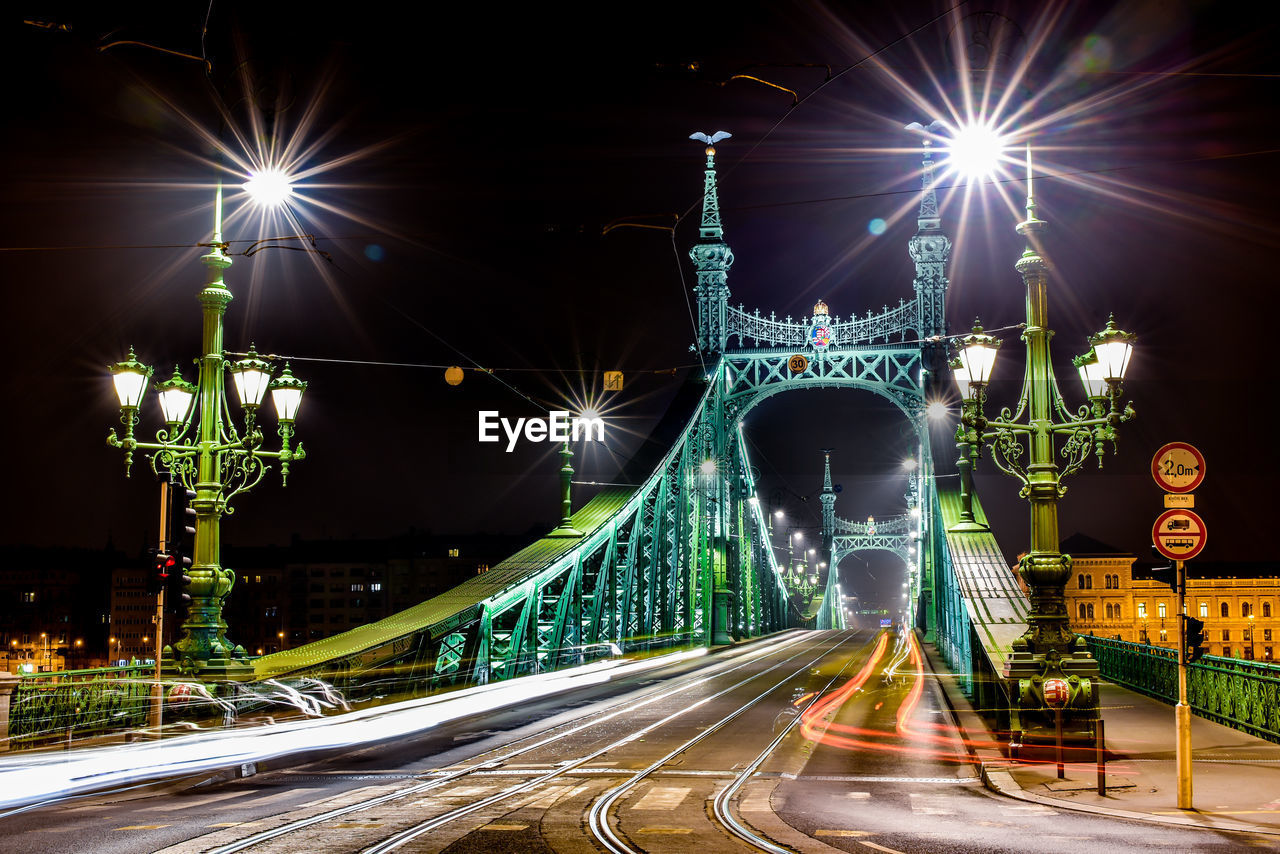 Light trails on bridge at night