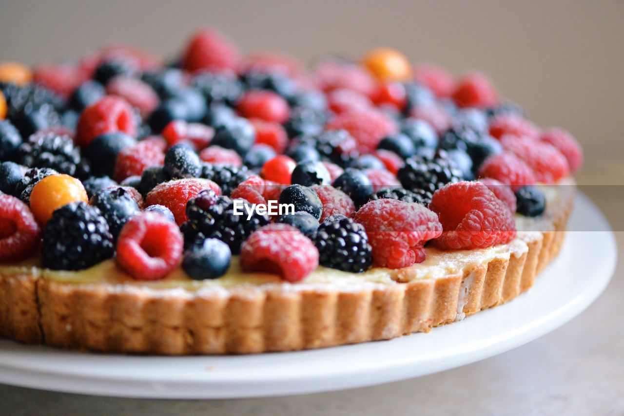 Close-up of berry tart in plate on table