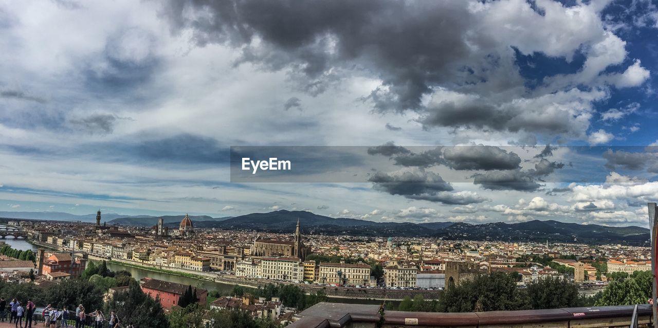 AERIAL VIEW OF CITY AGAINST SKY