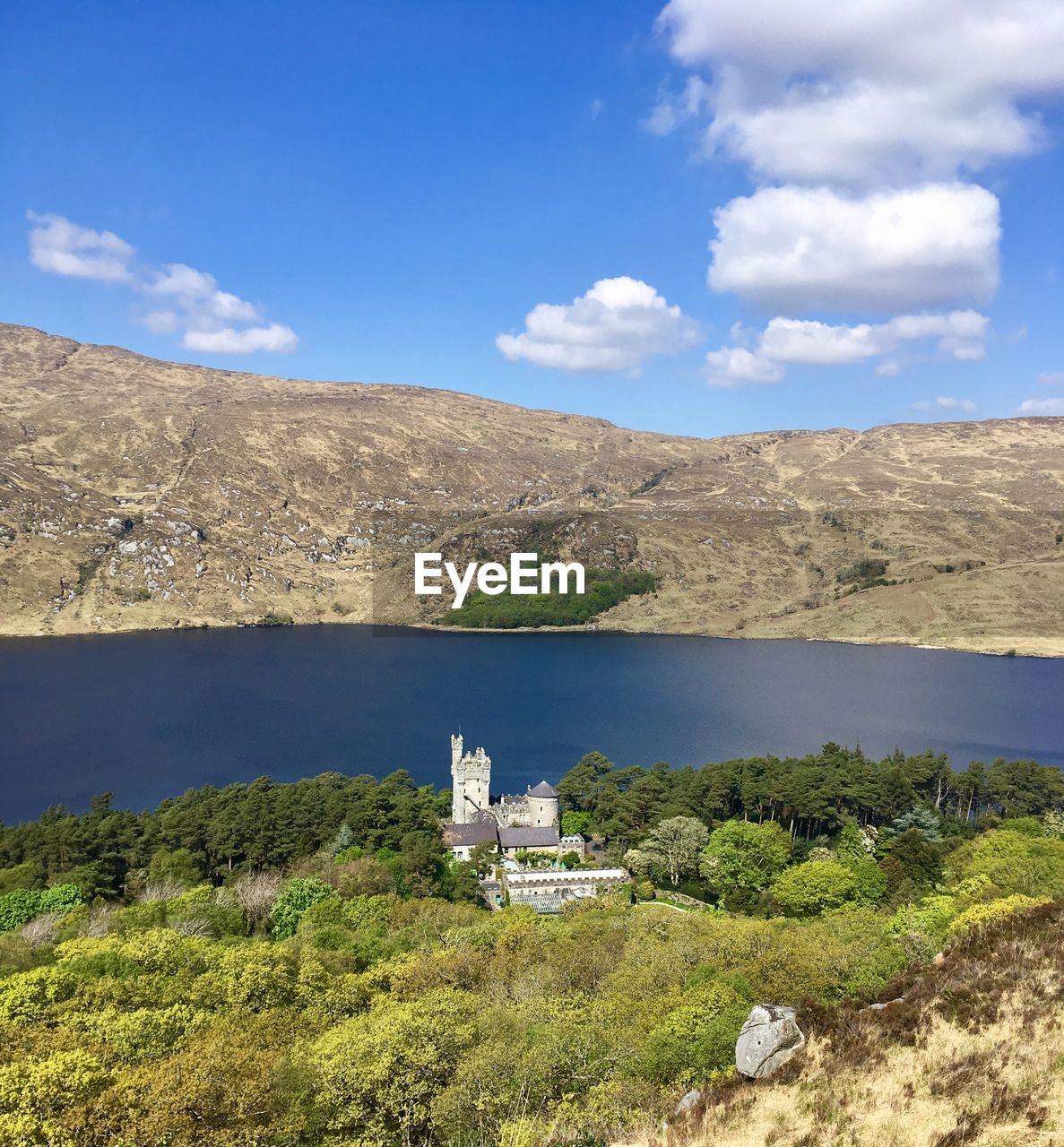 SCENIC VIEW OF LANDSCAPE WITH MOUNTAIN IN BACKGROUND