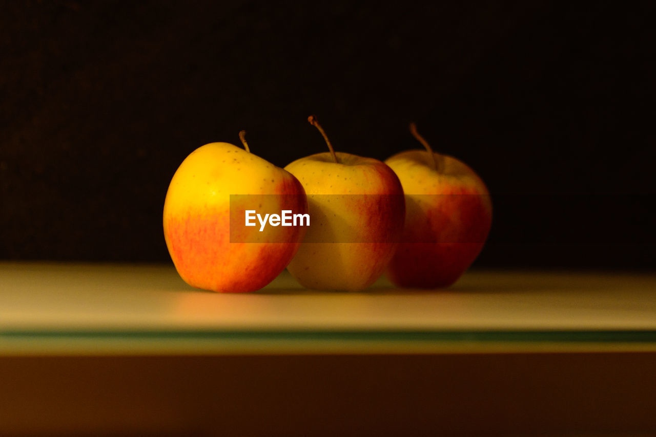 Close-up of apples on table
