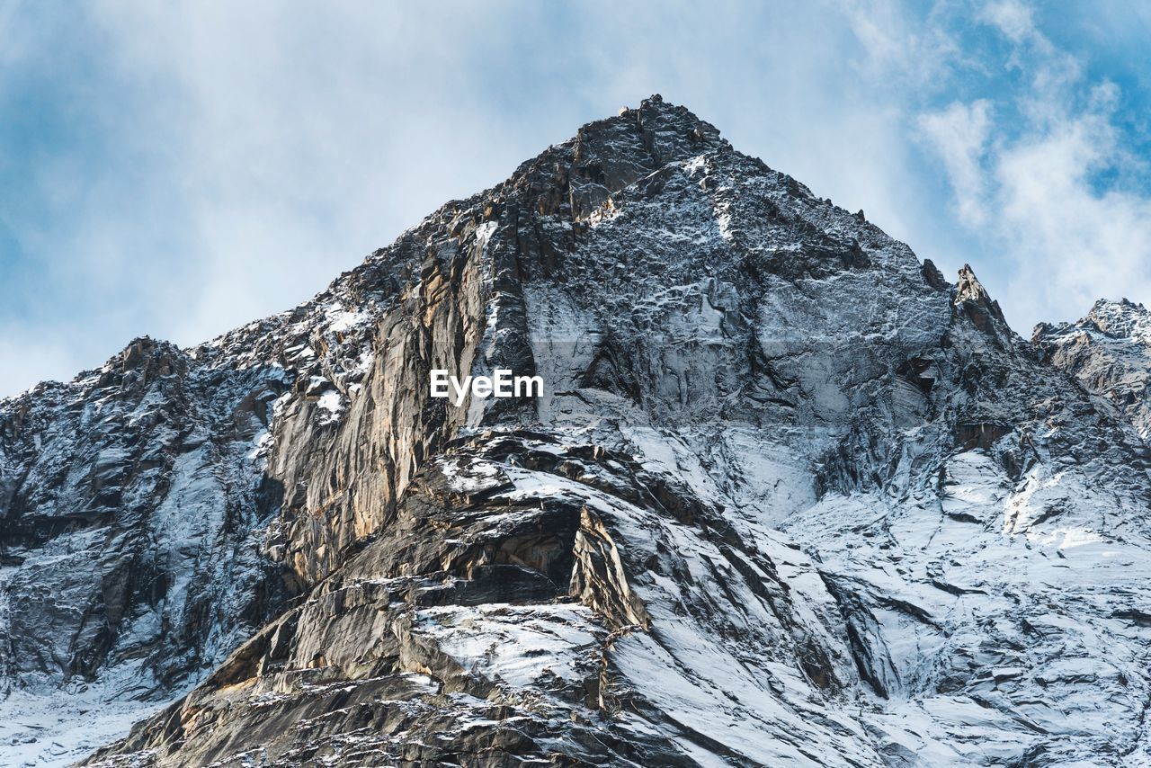 Scenic view of snowcapped mountain against sky