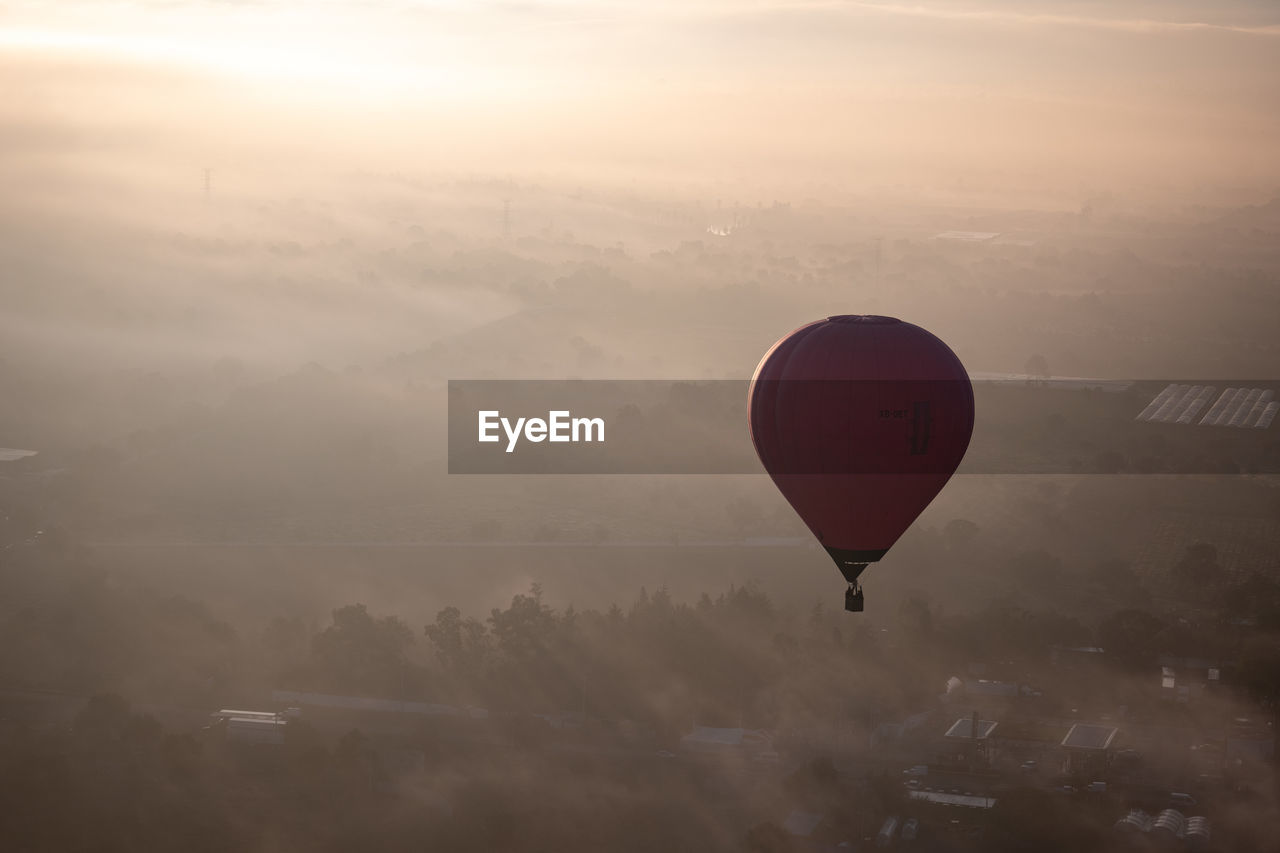 HOT AIR BALLOON FLYING IN SKY