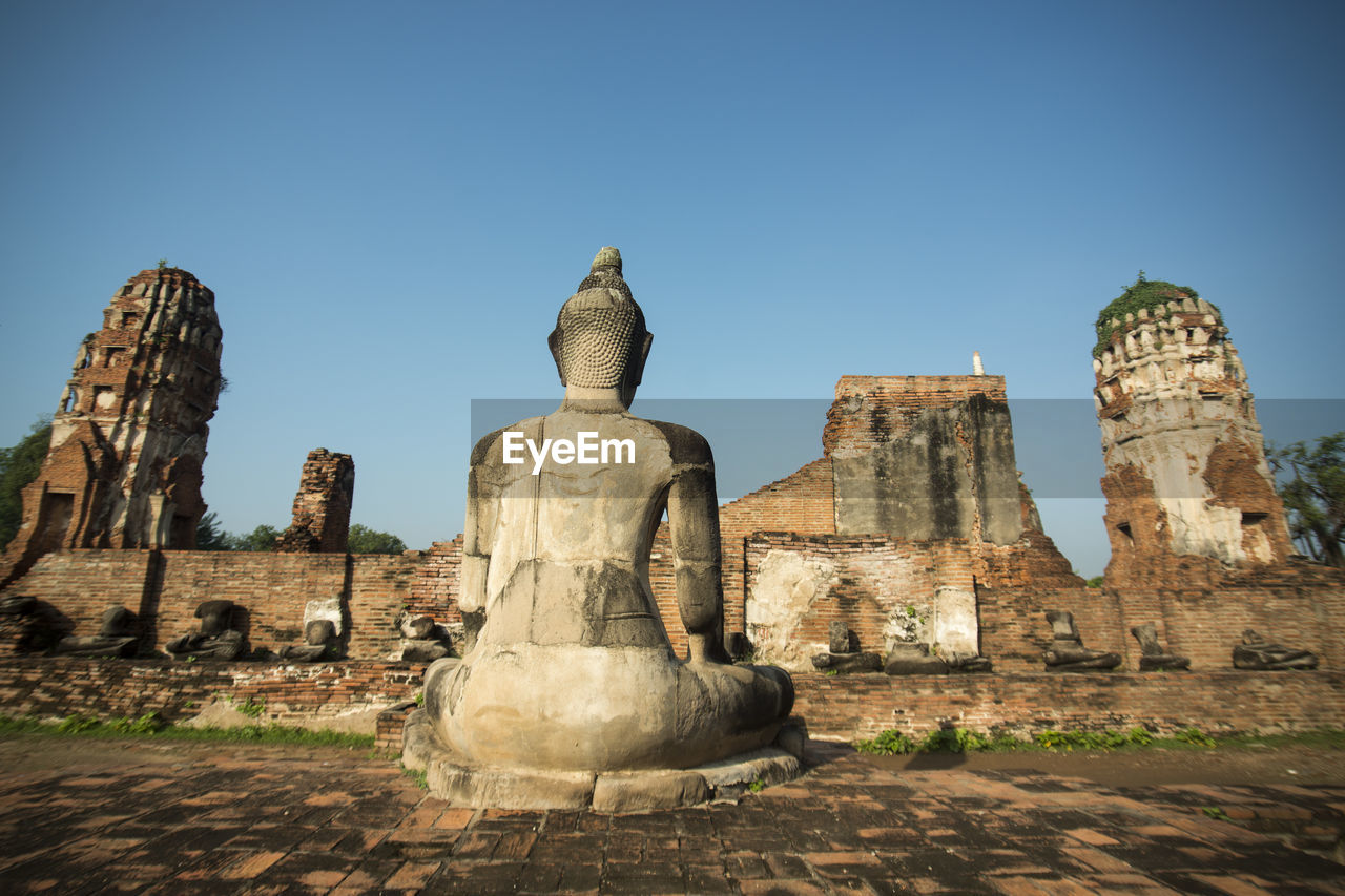 Old ruins against clear blue sky