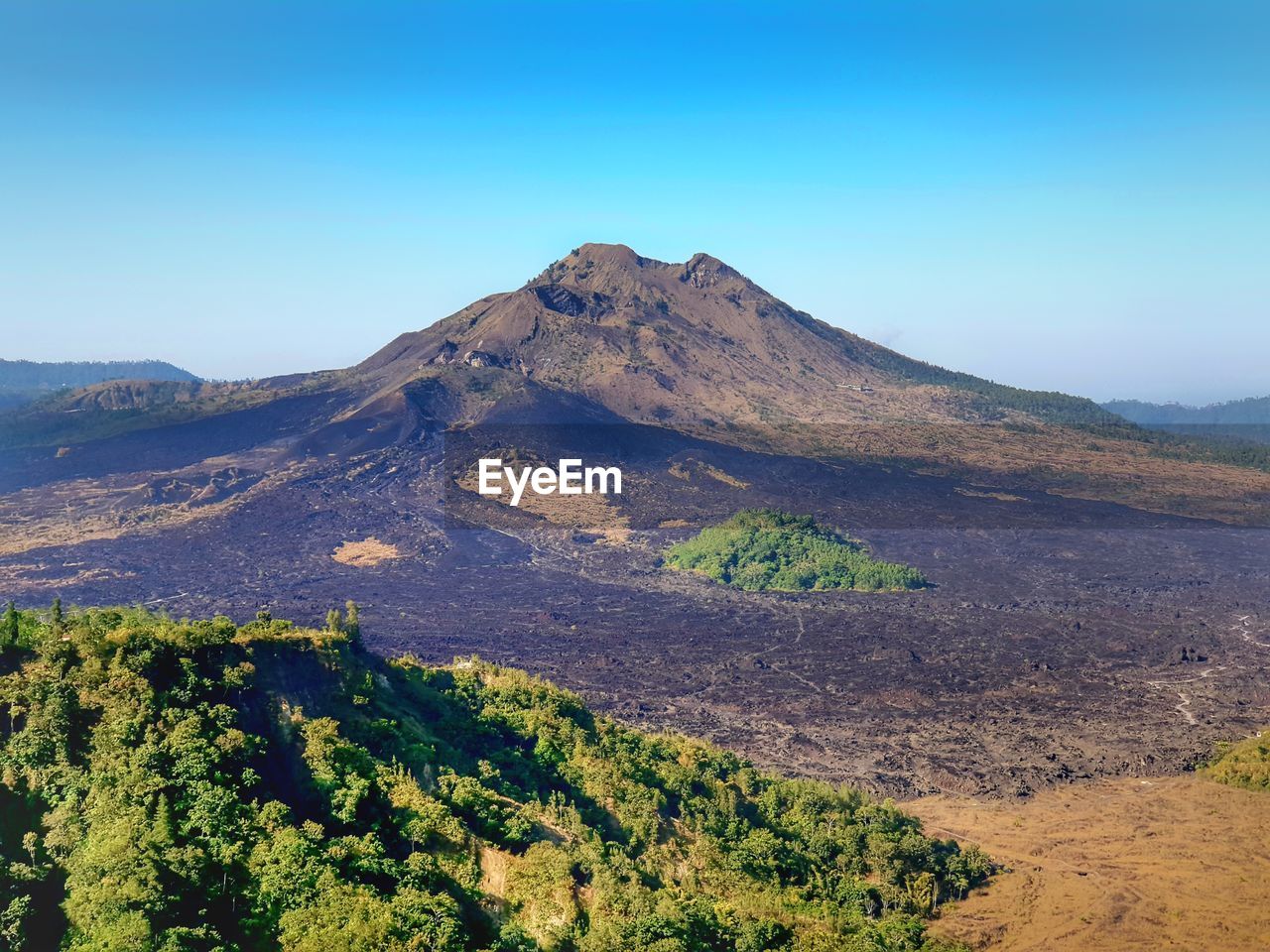 SCENIC VIEW OF MOUNTAINS AGAINST BLUE SKY