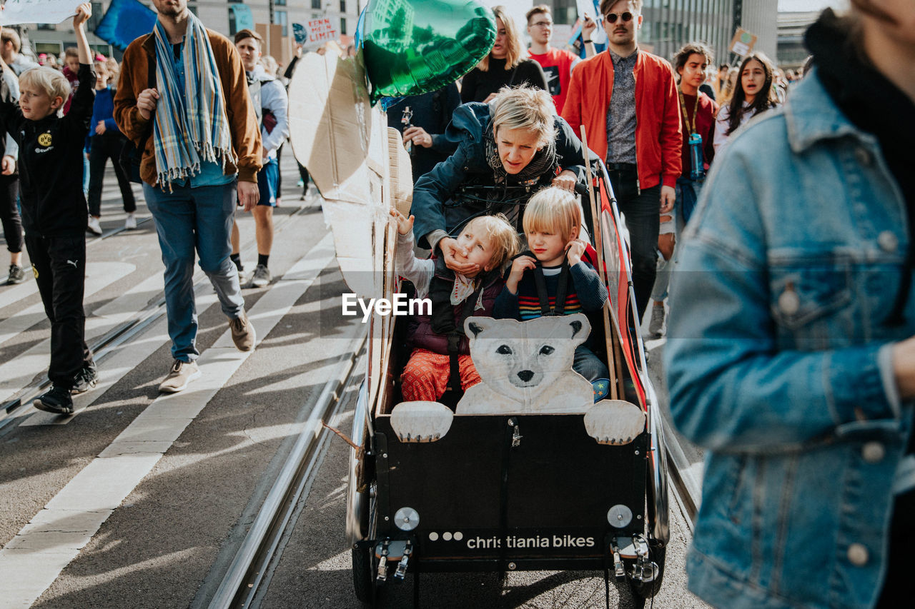 GROUP OF PEOPLE ON THE STREET