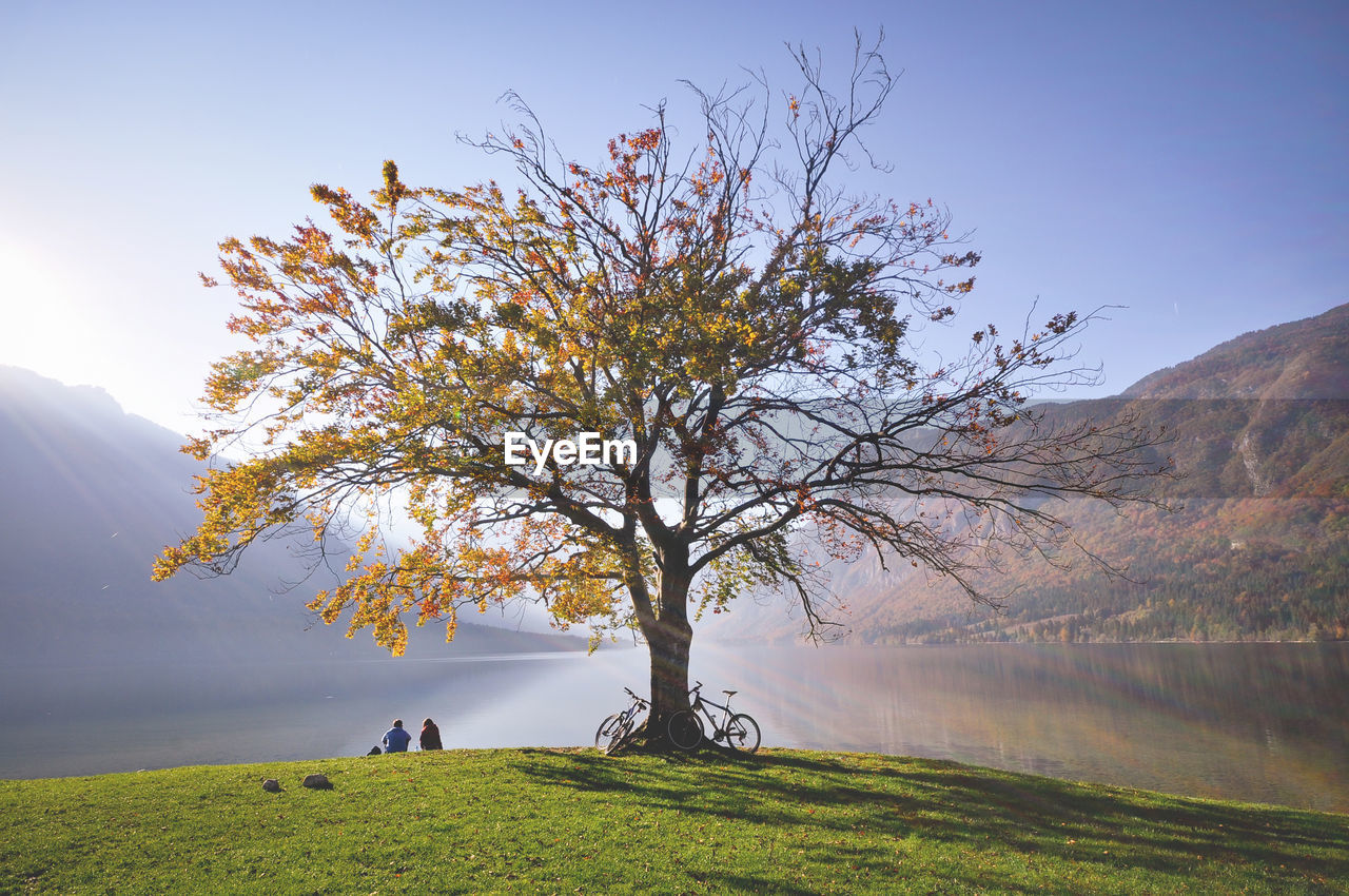 Scenic view of lake with mountains in background