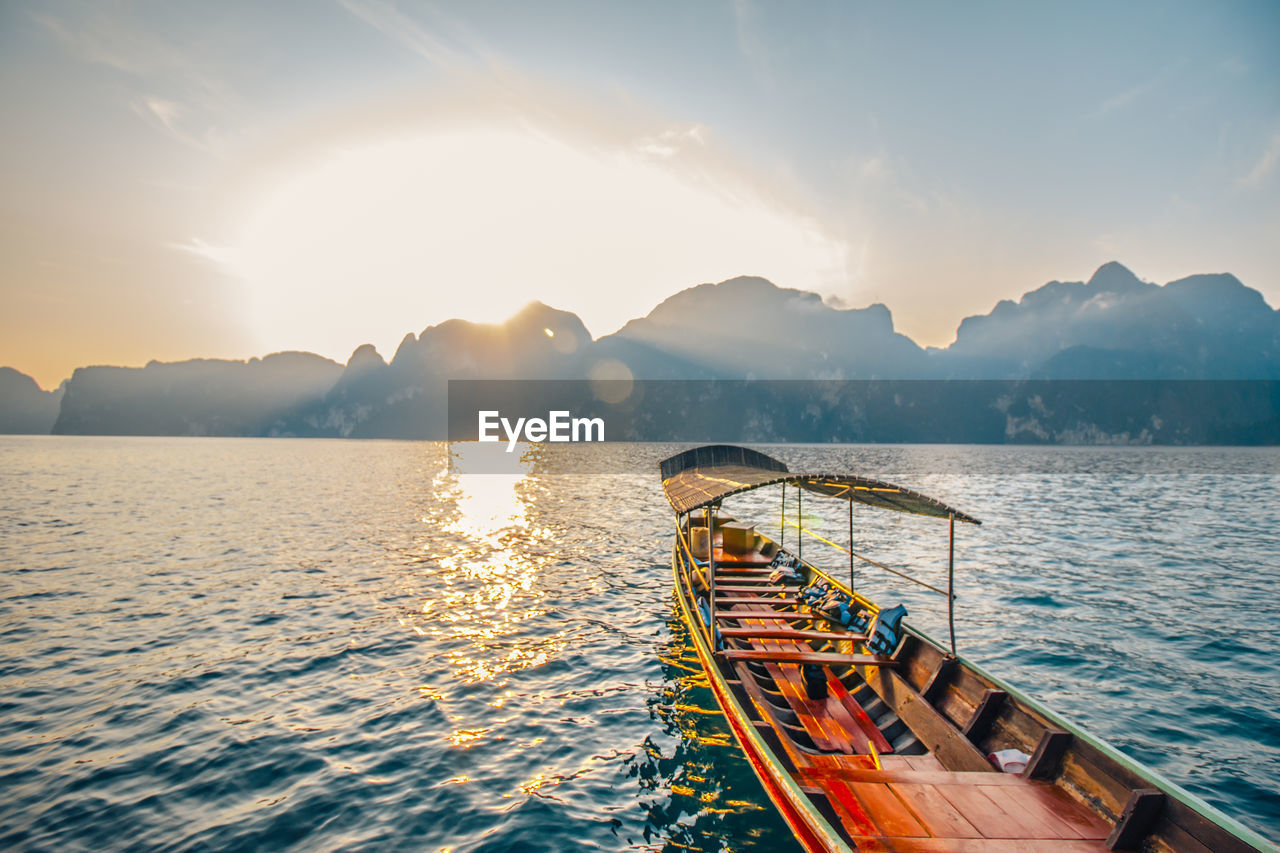 SCENIC VIEW OF LAKE DURING SUNSET