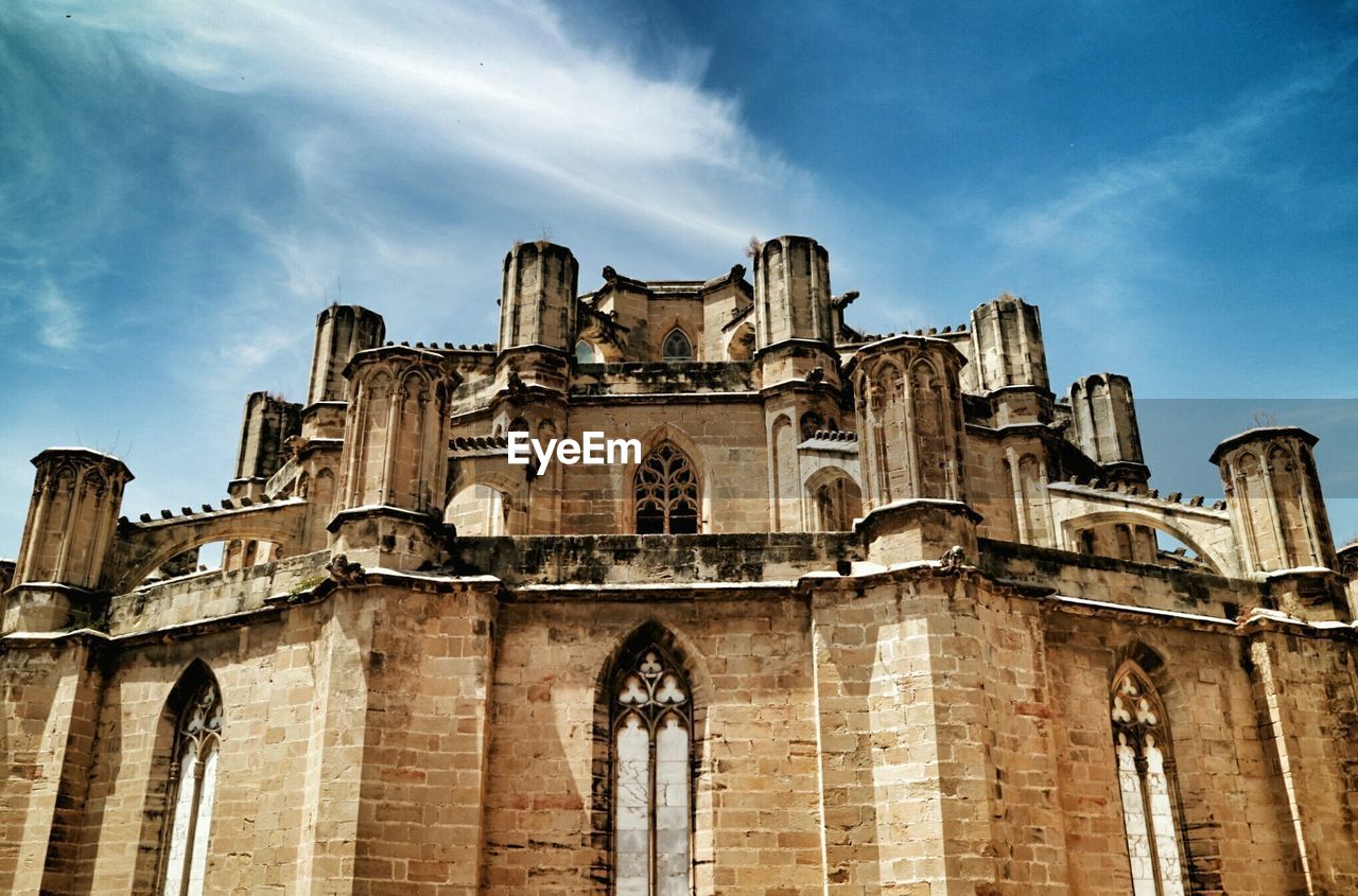 Low angle view of historic building against sky