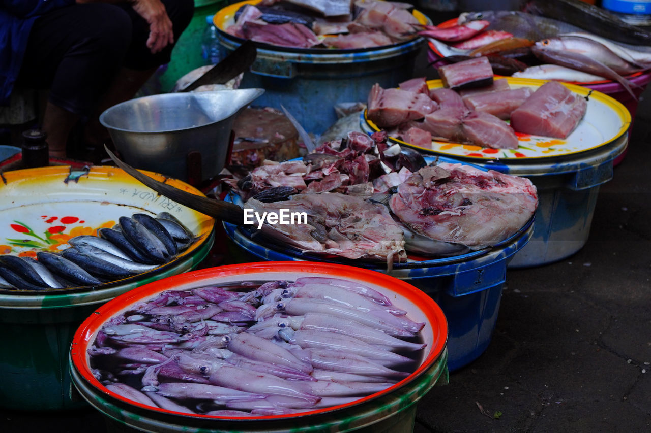 Photo of fresh seafoods in traditional market, banyuwangi, east java, indonesia. street photography