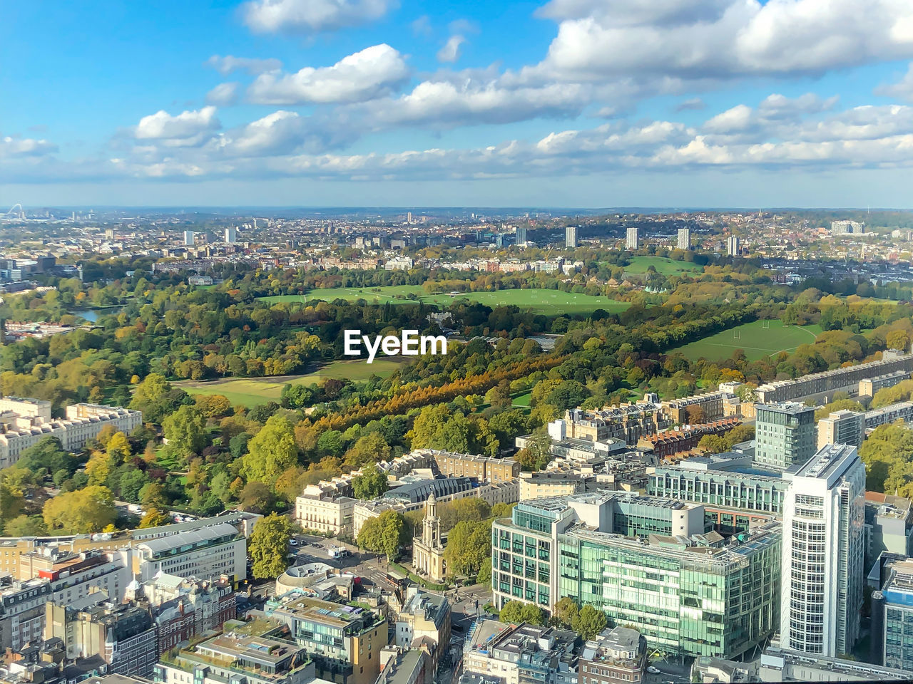 HIGH ANGLE SHOT OF TOWNSCAPE AGAINST SKY