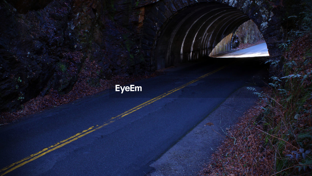 Road leading towards tunnel