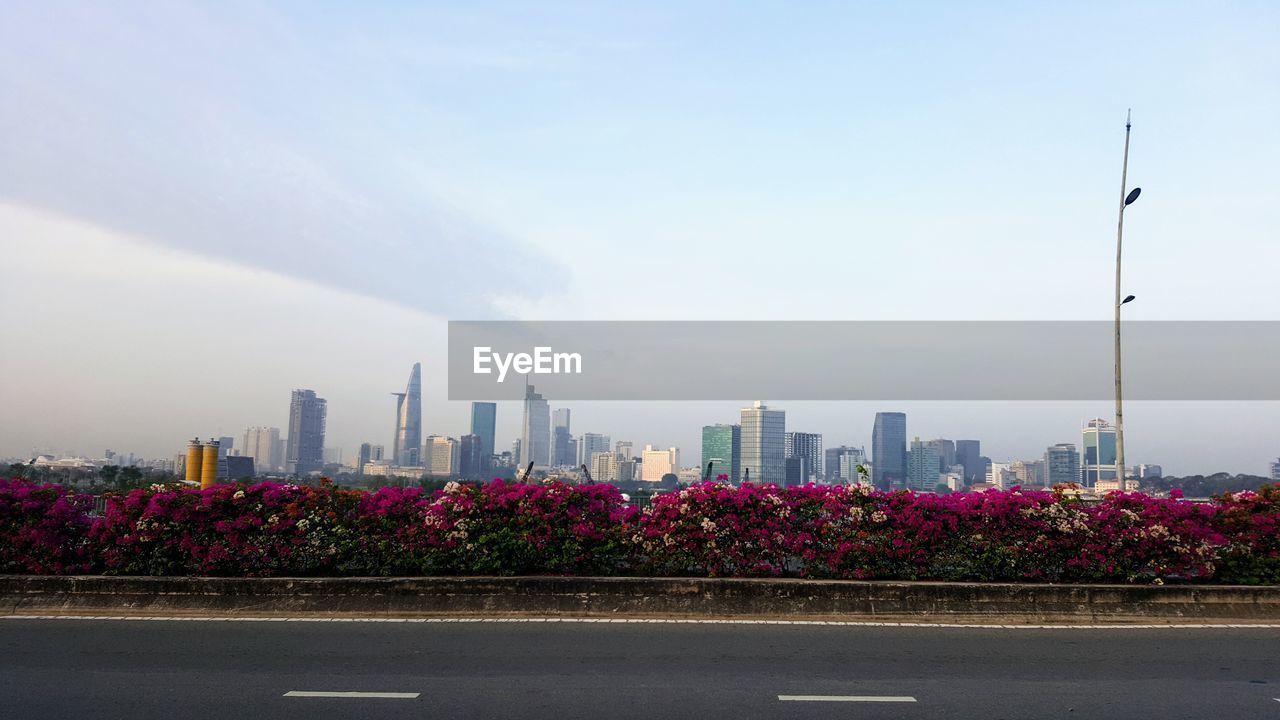 View of city buildings against sky