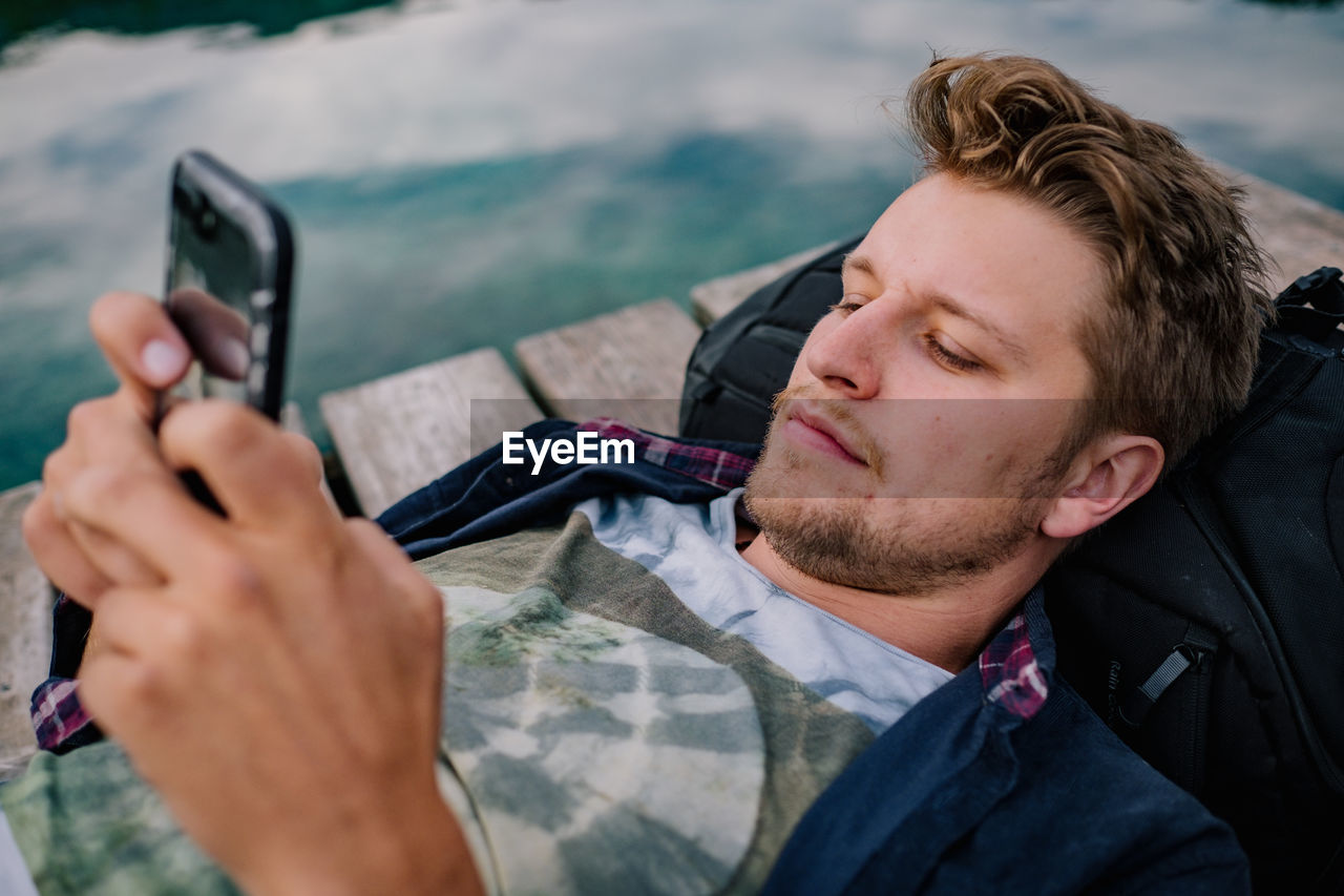 Young man using mobile phone 