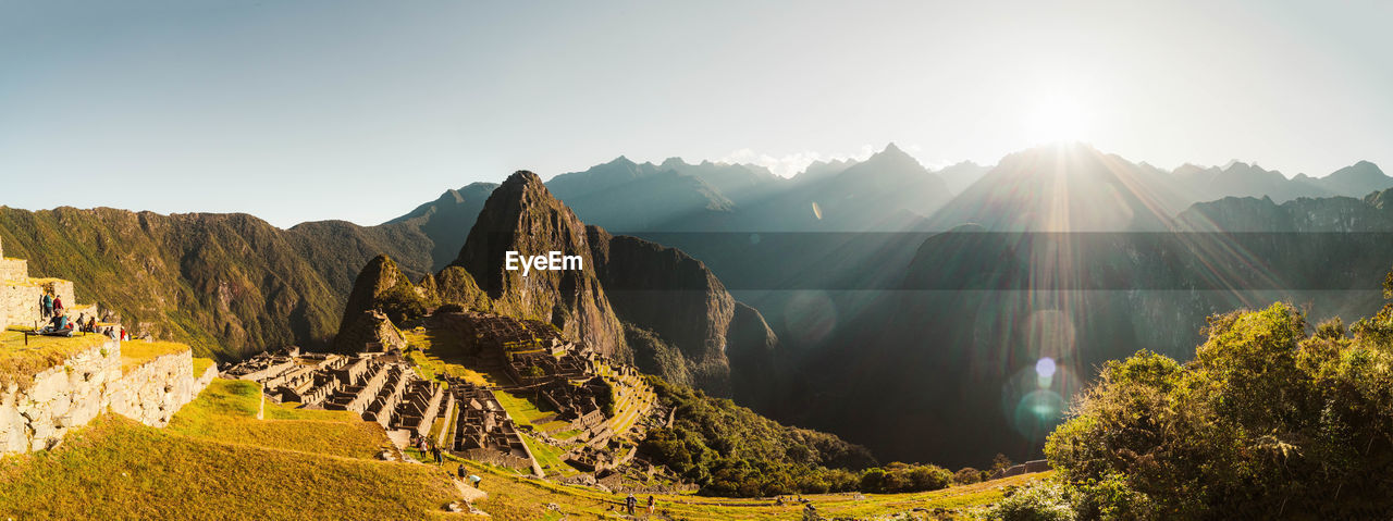 Machu picchu old inca ruins at sunrise in peru