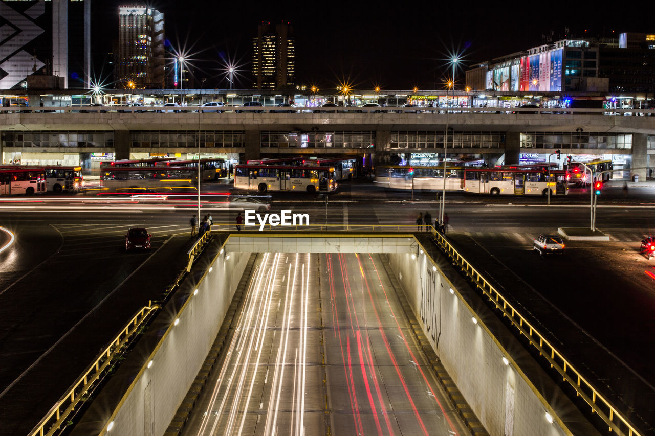 HIGH ANGLE VIEW OF LIGHT TRAILS ON CITY STREET