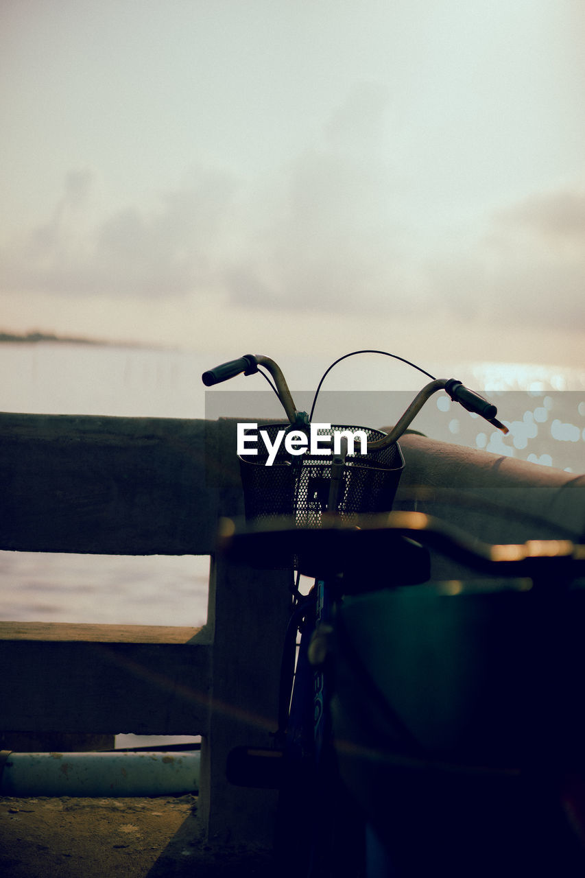 Close-up of bicycle against sky