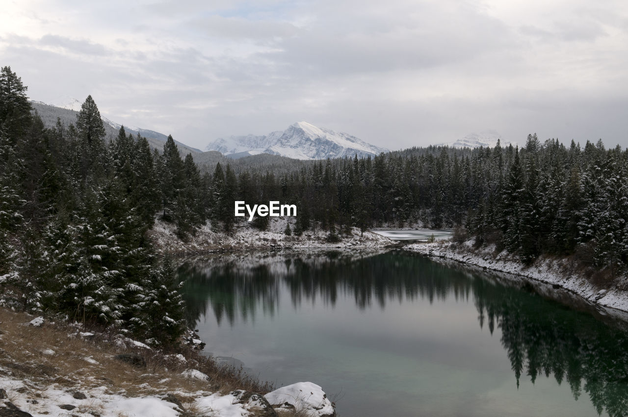 Scenic view of mountains against sky during winter