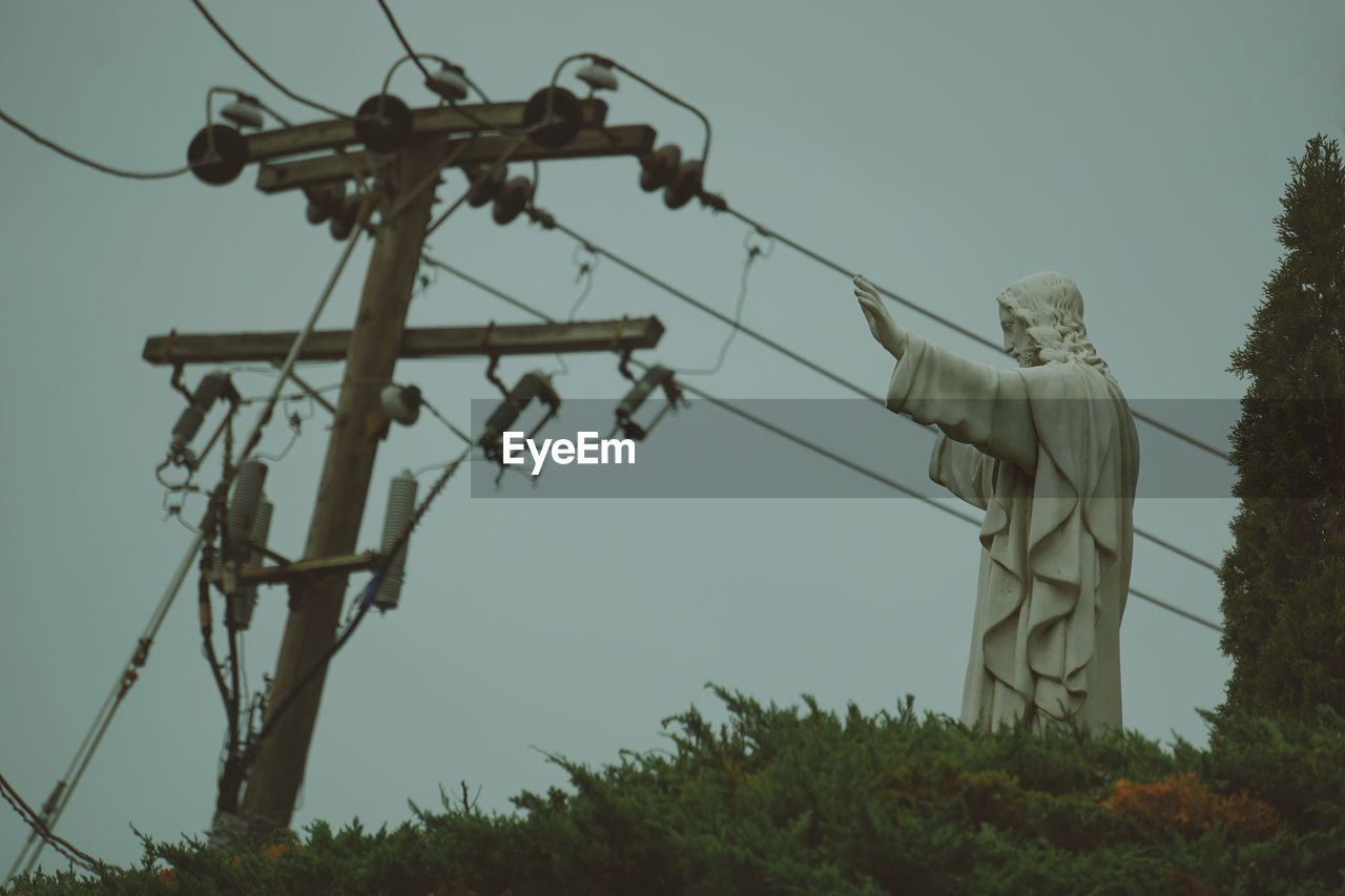 Low angle view of power lines