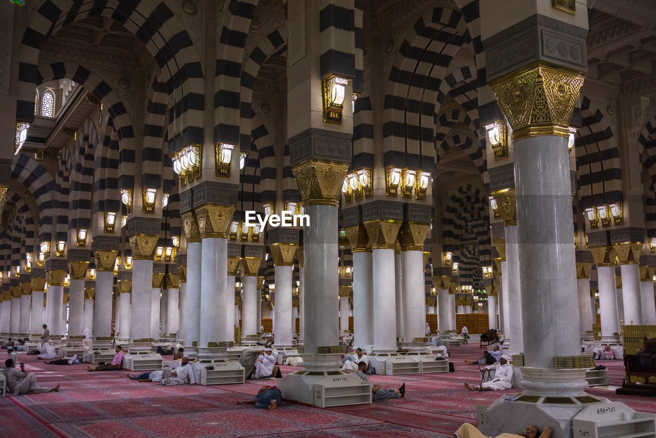 PANORAMIC VIEW OF ILLUMINATED CITY AT NIGHT