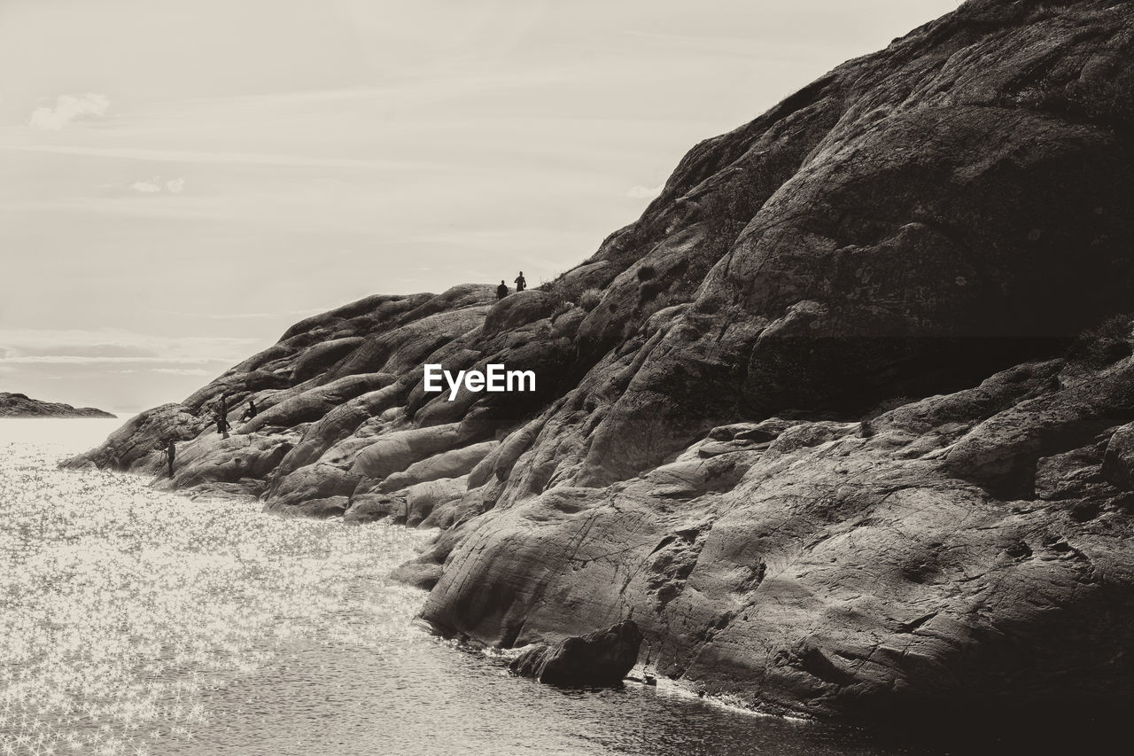 SCENIC VIEW OF ROCK FORMATION AGAINST SKY