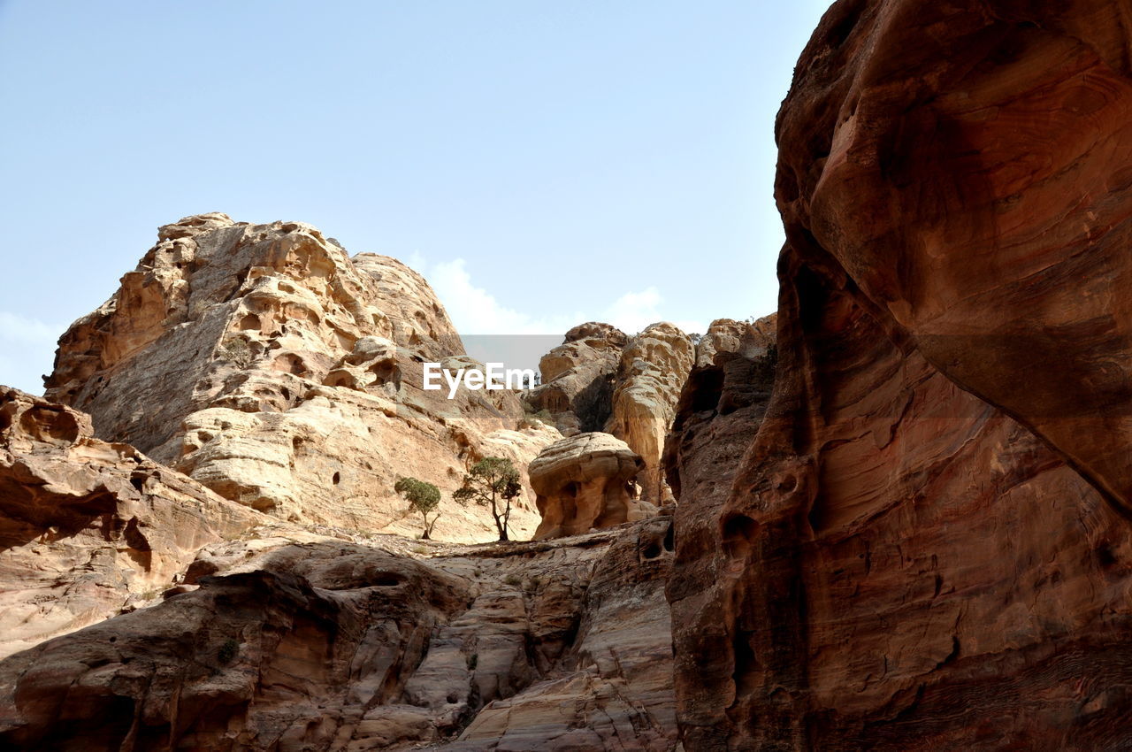 Low angle view of rock formations in jordan at petra