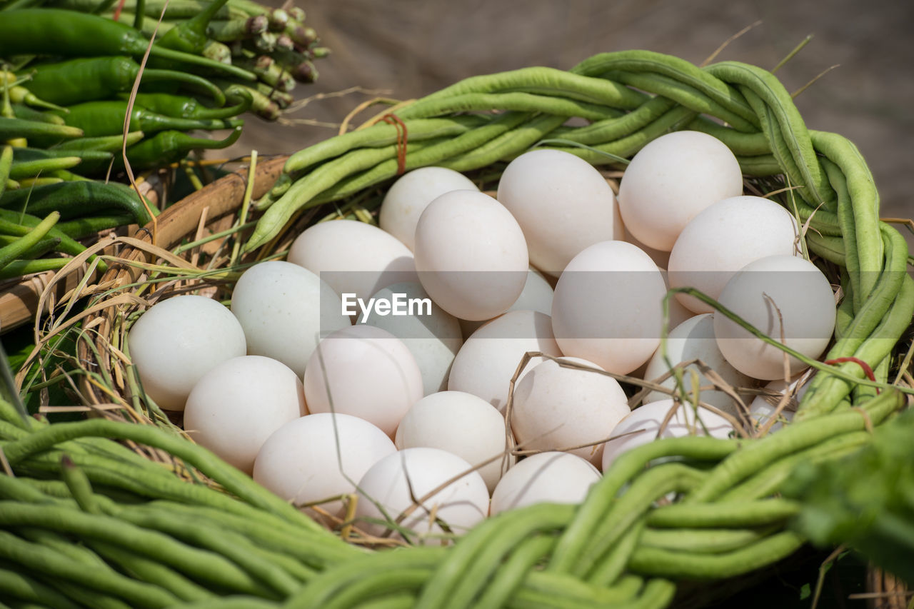 Close-up of eggs and green vegetables
