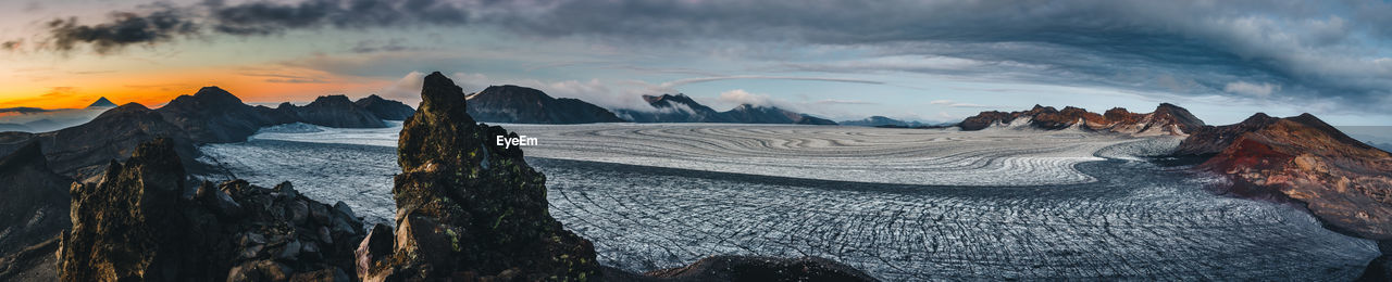 Panoramic view of landscape against sky during sunset