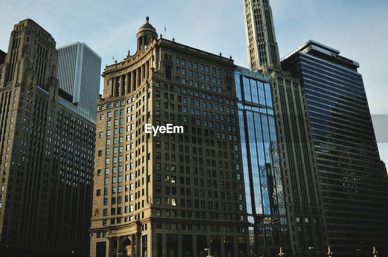 Low angle view of skyscrapers against sky