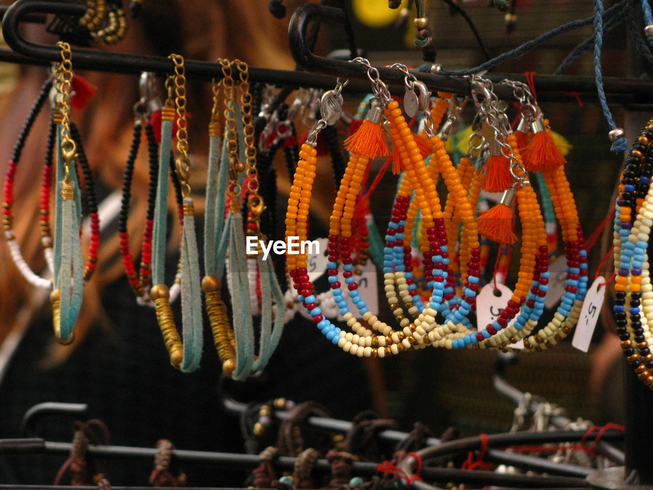 Close-up of bracelets for sale in market