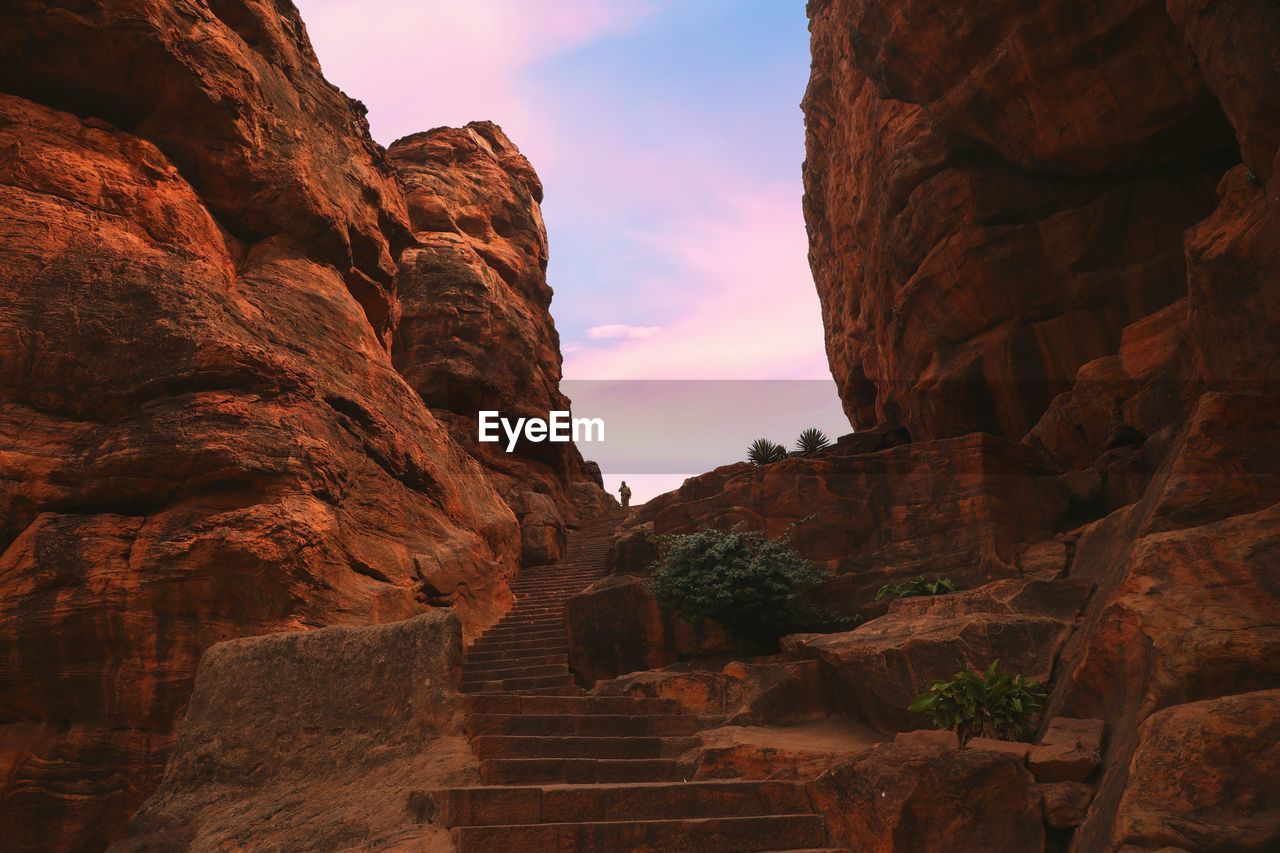 Low angle view of rock formations at sunset