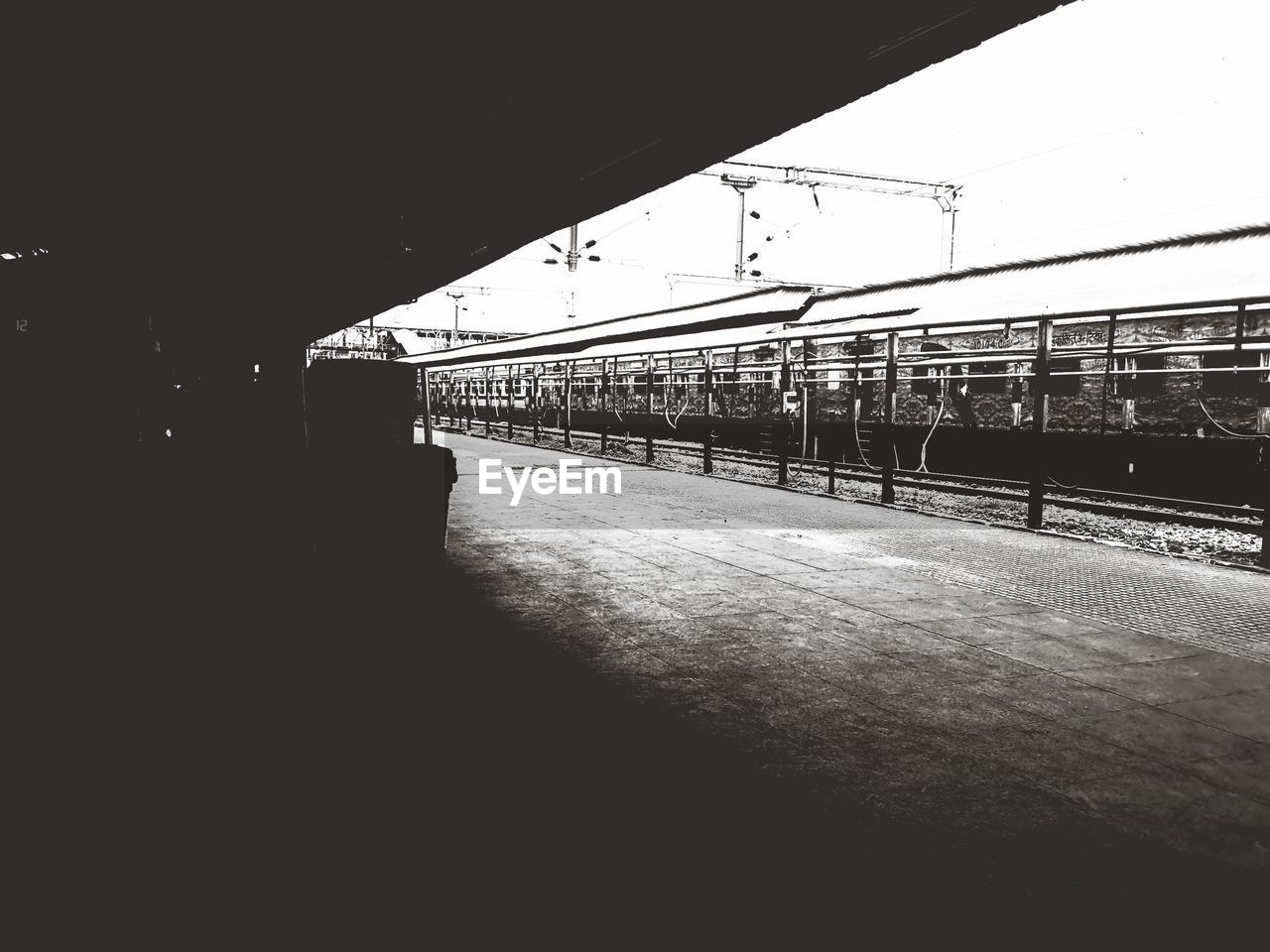 TRAIN AT RAILROAD STATION PLATFORM
