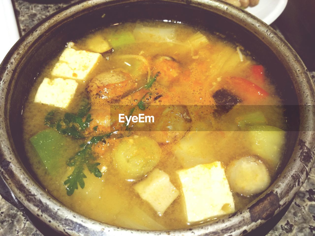 High angle view of soup in container on table